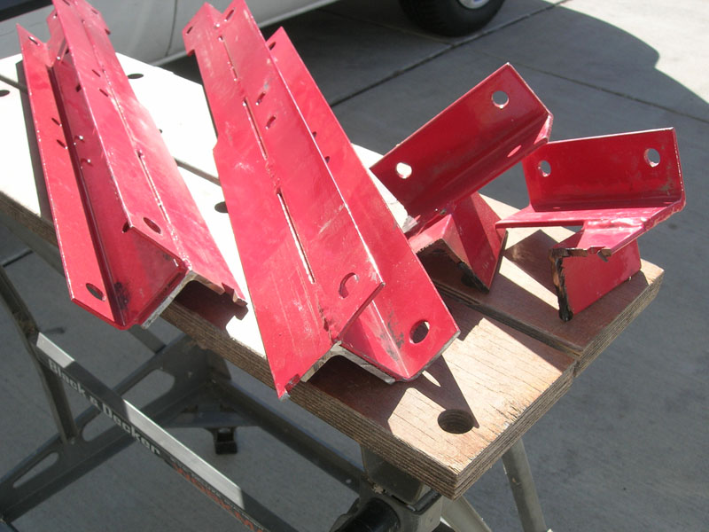 The axle mounting with the small folding-wheel brackets cut off