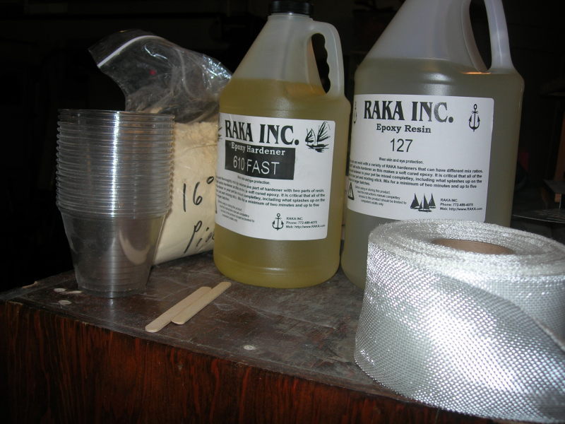 Epoxy resin, fast hardener, mixing cups and fiberglass tape from Raka