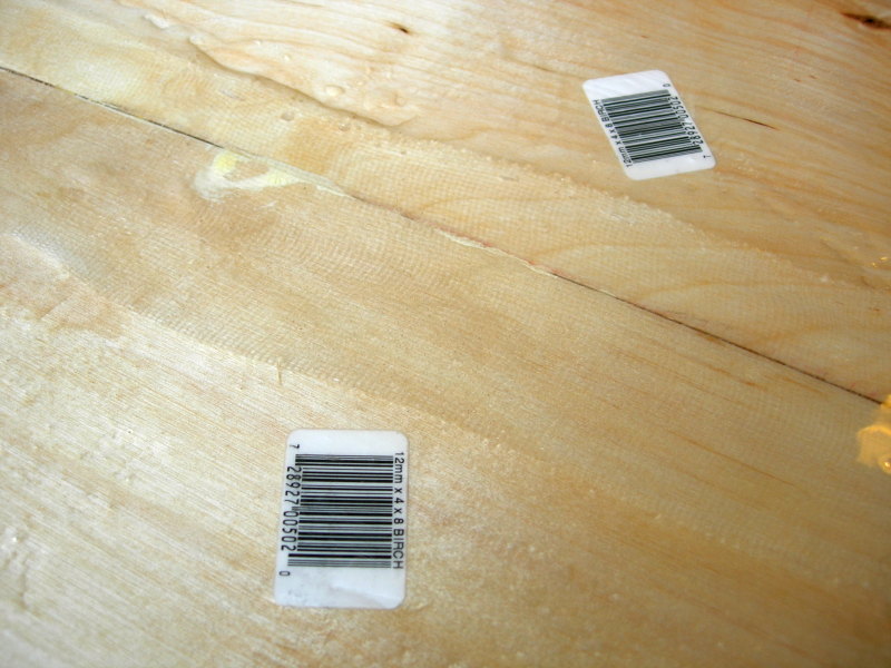 Cured epoxy with the raised edge of the fiberglass tape showing