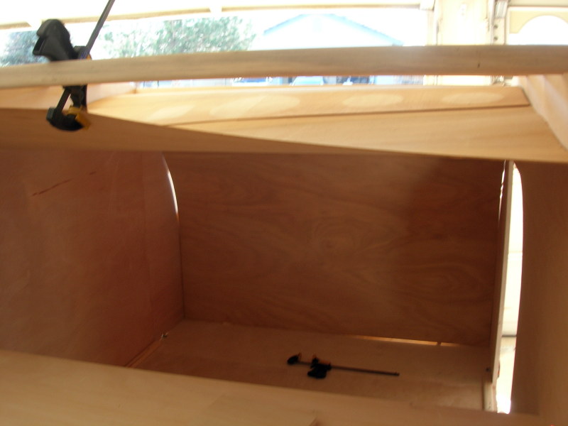 The first interior roof panel being test-fitted