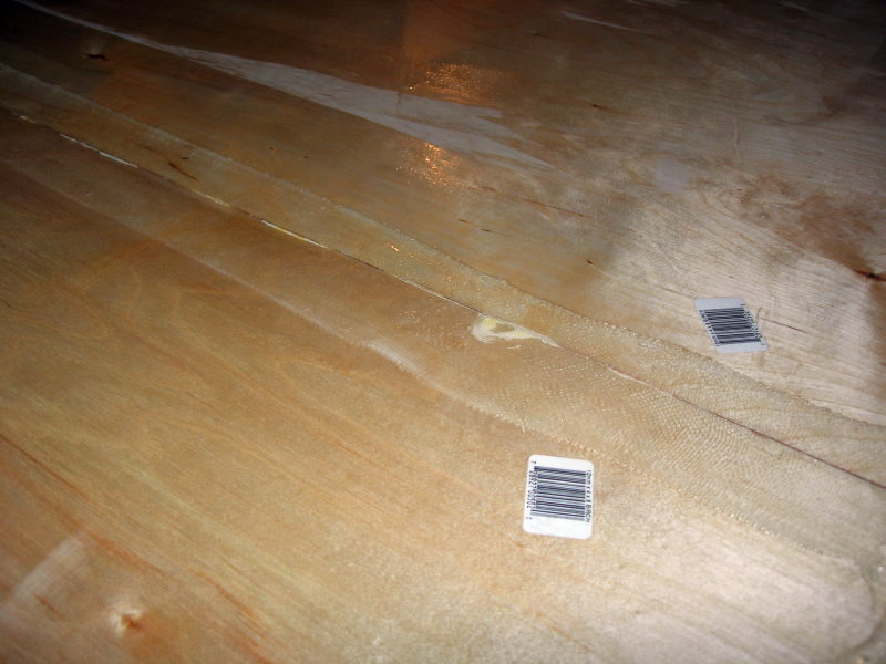 Fiberglass tape under epoxy along a floor seam